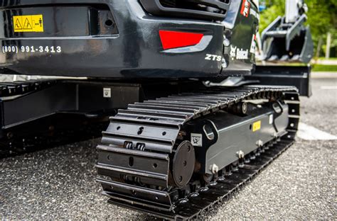 mini excavator metal tracks|installing track on mini excavator.